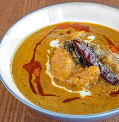 Stew oxtail – slow-cooked Caribbean oxtail stew at Caribbean Stove PickUp, London, Ontario